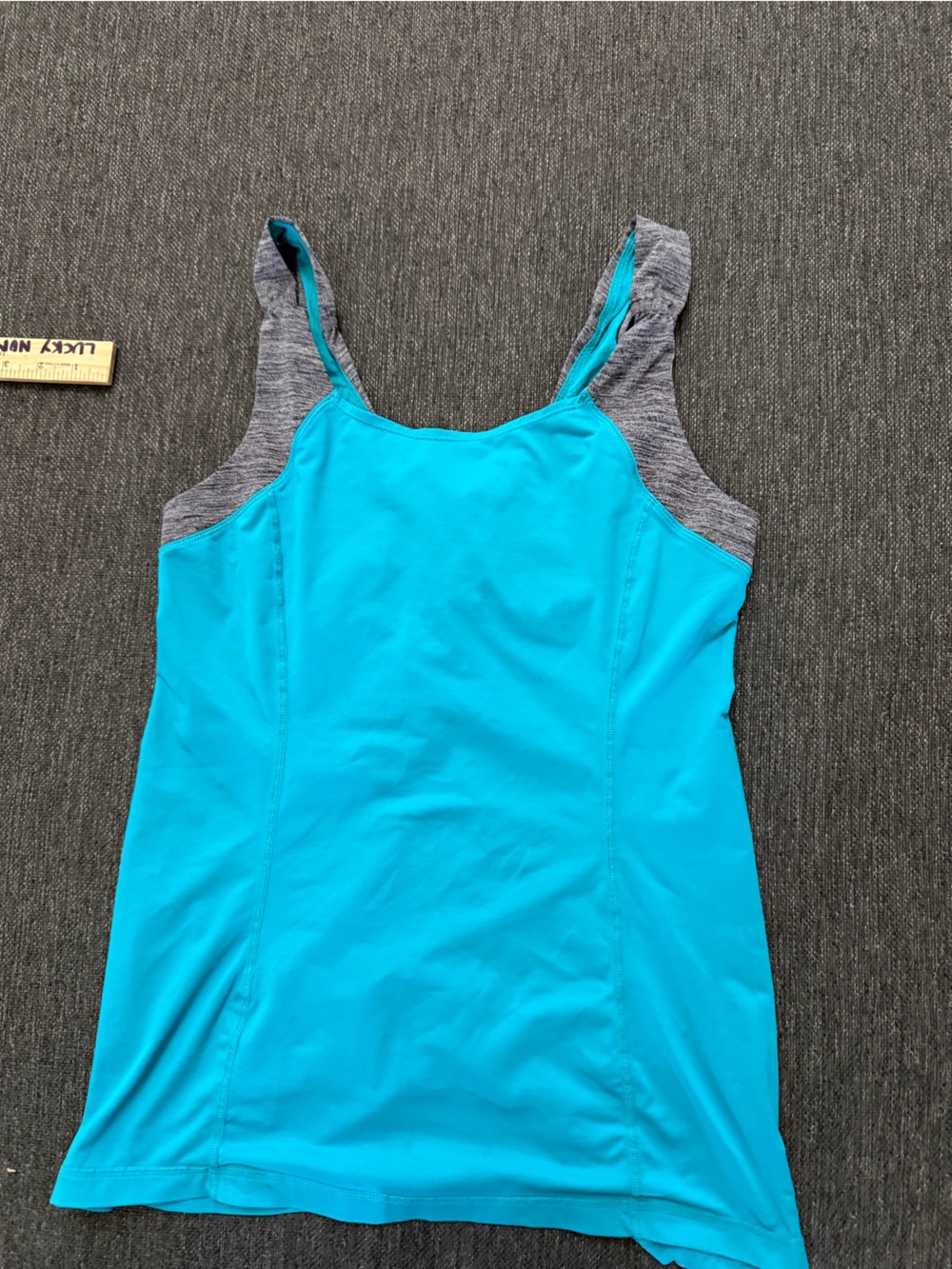 Lululemon throwback size. 8/10 Turquoise Active Tank with Gray Accents